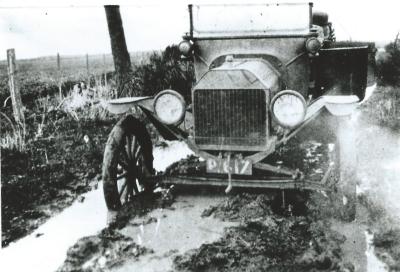 Black and White photograph. Mr N Halls bogged on Great Eastern Hwy Badgetopping
