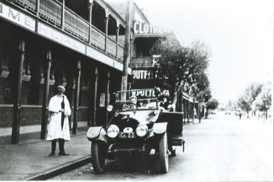 Black and White photograph.  Kellerberrin Flour Miller Thomas Ockerby's Cadillac V8 outside the Commercial Hotel, Northam