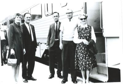 Black and White photograph.  First  prospector train. L - R Dorothy and William Forsyth, S M Cowan Tom and Hazel Bennett