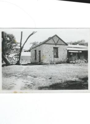 Black and White photograph of  natural rock constructed house in Moore Street, Kellerberrin 1947