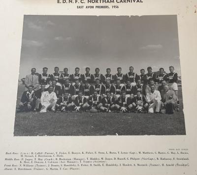 Black and White photograph.  EDNFC Northam Carnival - East Avon Premiers 1956 Back Row:  H Caffell (Patron), V Fisher, E Bowyer, K Fisher, E Stone, L Burns, T Loton (Capt), M Matthews, C Baxter, C May, L Davies Middle Row:  P Jasper, T May (coach), R B...
