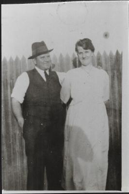 Black and White photograph.  Mr and Mrs Caddy Store keepers