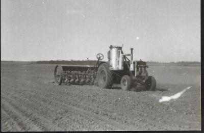 Black and White photograph.  Case tractor on Gas Producer - Hall's property