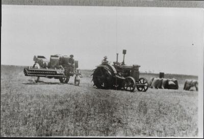 Black and White photograph.  Tractor and Header Bennetts - Daadenning Creek