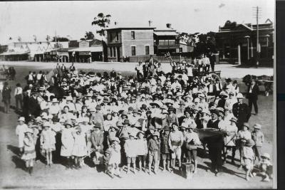 Black and White photograph.  Armistice Day celebrations on the end of WWI