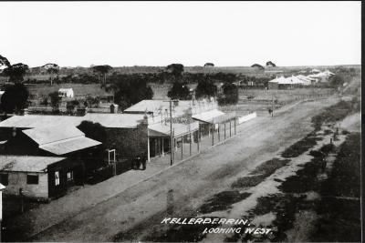 Black and White photograph.  Looking West along Massingham St from Water Tower