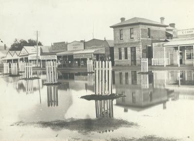 Black and White photograph of Massingham Street, Kellerberrin during the rains in August 1921