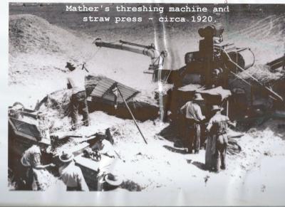 Black and White photograph Mathers Threshing Machine and straw press 1920