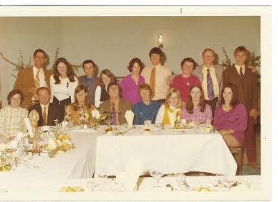 Colour photograph.  Kellerberrin Farmers Co-op staff Xmas party early 1970's.  Colleen Humpleby, Stan Humpleby, Ron Johnson, Charmaine Burke, Dawn Ware, David Smith (Mgr) Jane Williams, Andrew McLellan, Betty Johnson, Des Morgan, Linda Morgan, Jenny Wi...