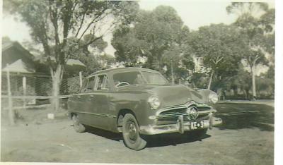 Black and White photograph.  Old car KE 3---