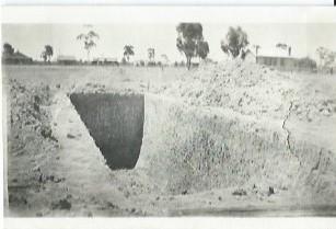 Black and White photograph Kellerberrin 1927 beginning of first oil depot. Notes on back of photo - "Kellerberrin 1927 beginning of first oil depot - Vacuum Oil co.  All petrol previousl carried from Perth by Jimmy Walker