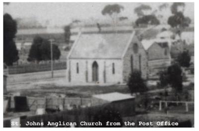 Black and White photograph. St John's Anglican Church.  Photograph taken from the Post Office