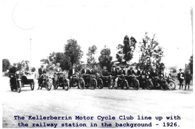 Black and white photograph.  The Kellerberrin Motor Cycle club line up background