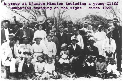 Black and white photograph.  A group at Djurien mission including a young Cliff Humphries standing on the right