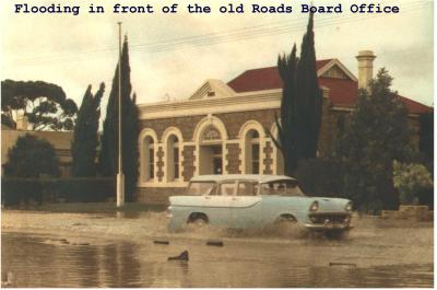 Colour photograph Flooding in front of the old Road Boards Office