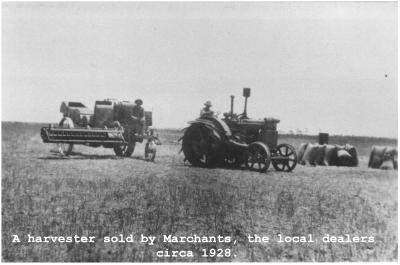 Black and White Photograph. A harvester sold by Marchants, the local dealers circa 1928