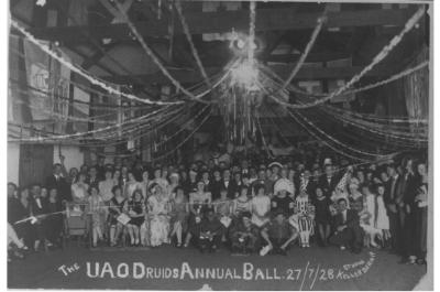 Black and White photograph.  UAOD  (United Ancient Order of Druids) Annual Ball.  Looks like a costume ball