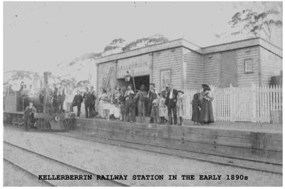 Black and white photograph in the early 1890's. Kellerberrin Train Station. People on platform and train pulled up at platform