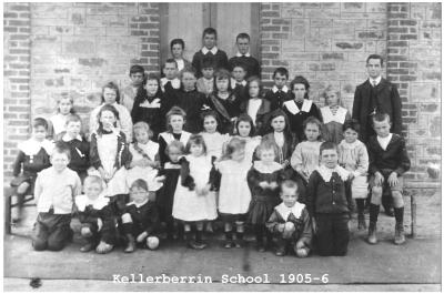 Black and White photograph Kellerberrin School.  36 Students from Kindergarten to High School, 1 teacher