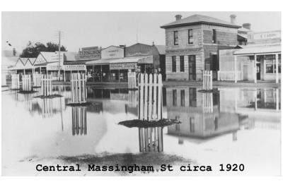 Black and White photograph.  Central Massingham Street during Flood