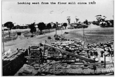 Black and White photograph.  Looking West from the Flour Mill circa 1920