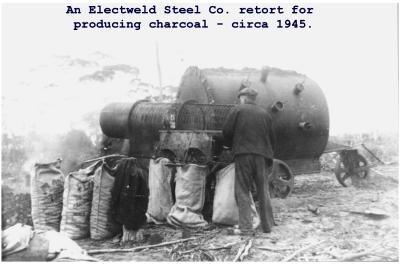 Black and White photograph.  An  Electweld Steel co retort for producing charcoal circa 1945
