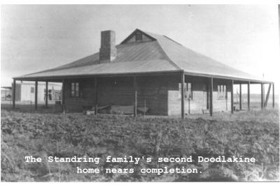 Black and White photograph.  The Standring family's second Doodlakine home nears completion