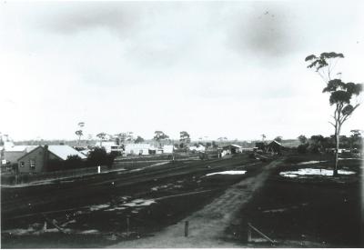 Black and White photograph.  Shows Station Masters house and Railway Station.