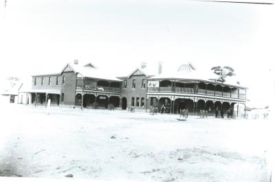 Black and White photograph Kellerberrin Hotel from East Crossing.  Hotel extension complete