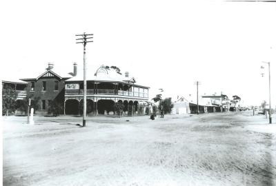 Black and White photograph.  Includes Post Office and Street Lights