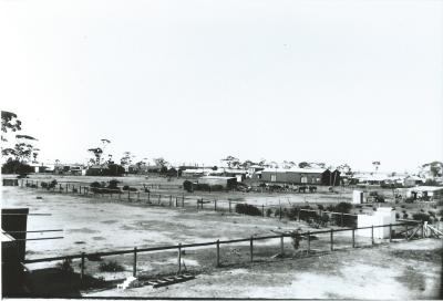 Black and White photograph.  Kellerberrin from school yard, includes old and new Post Office