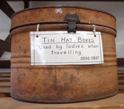 (A) TIN HAT BOX LIGHT BROWN (B)TIN HAT BOX DARKER BROWN WITH BLACK BANDS ,LID & BODY