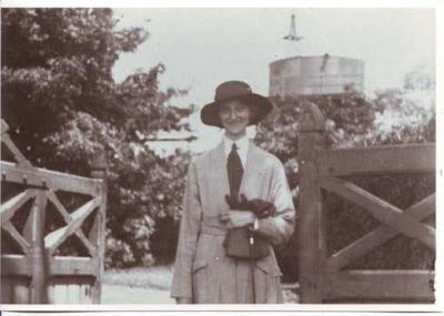 ELINOR GEORGE DRESSED FOR DRIVING