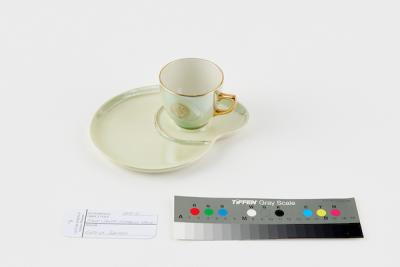 CUP AND SAUCER: WEMBLEY WARE, GREEN LUSTRE SUBIACO MUNICIPALITY TENNIS SET