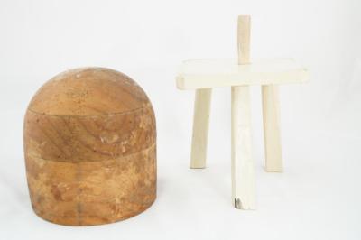 WHEEZLE: HAT BLOCK ON WHITE STOOL
