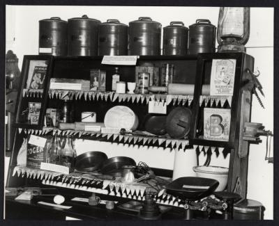 PHOTOGRAPH: MUSEUM DISPLAY, KITCHEN DRESSER; CANISTERS; GENERAL KITCHEN EQUIPMENT