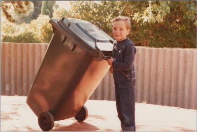 PHOTOGRAPH: 'ALEX PASSMORE AND MOBILE RUBBISH BIN'