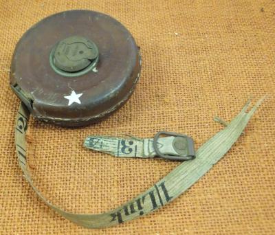 LINEAR TAPE IN LEATHER CASE