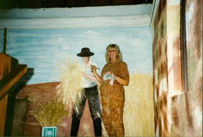 MURAL; PERSON IN WHEATFIELD