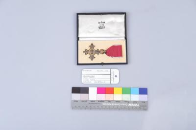 MEDAL: O.B.E. WITH PLASTIC COVER, CITATION AND BOOK OF STATUTES