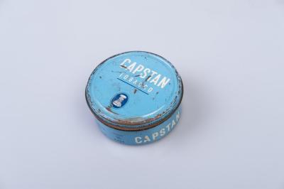 TOBACCO TIN - BLUE, WITH NAVY AND WHITE 'CAPSTAN' TRADEMARK. C. 1945