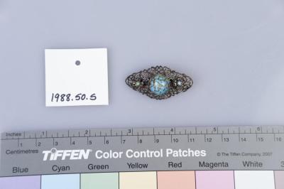 BROOCH: SILVER FILIGREE WITH BLUE AND GREEN STONE