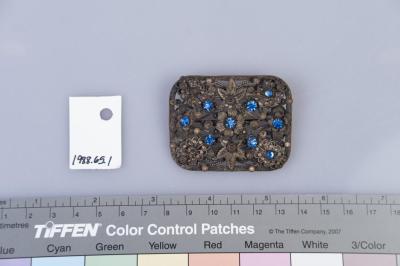 BROOCH: FILAGREE, FLOWER WITH BLUE STONES