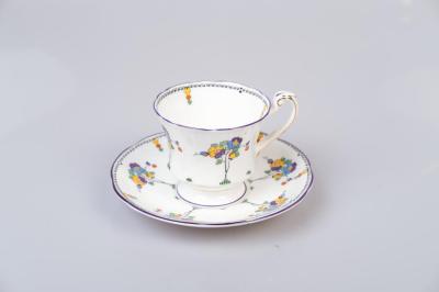 CUP AND SAUCER: BONE CHINA, FLORAL DESIGN