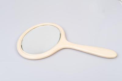 HAND MIRROR, XYLONITE.