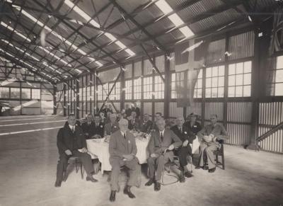 PHOTOGRAPH: OPENING OF METTERS LTD NEW PREMISES SALVADO RD, 1937. OFFICIAL PARTY DINING ON THE FACTORY FLOOR