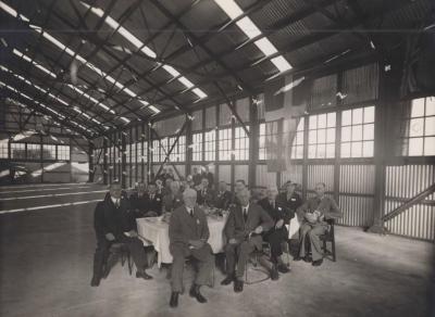 PHOTOGRAPH (COPY): OPENING OF METTERS LTD NEW PREMISES SALVADO RD, 1937. OFFICIAL PARTY DINING ON THE FACTORY FLOOR