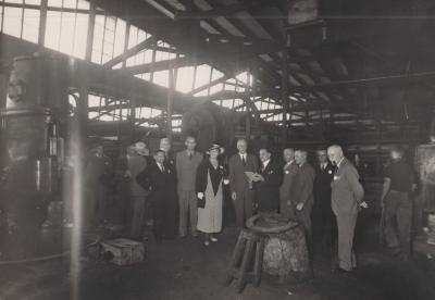 PHOTOGRAPH: OPENING OF METTERS' NEW PREMISES IN WEMBLEY, 1937. OFFICIAL PARTY INSPECTING FACTORY