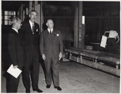 PHOTOGRAPH: PREMIER BRAND INSPECTING SHEET ENAMELLING, 70TH ANNIVERSARY OF METTERS LTD, 1965