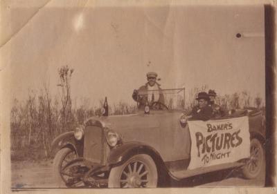 PHOTOGRAPH: PADDY BAKER AND TWO MEN IN A CAR, CIRCA 1925